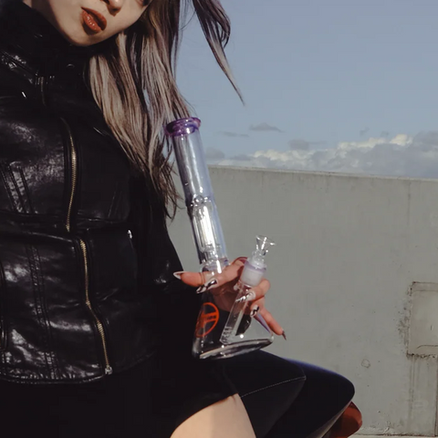 Shotties 30cm Single Fountain Glass Beaker Bong - Held by Female Model Outdoors